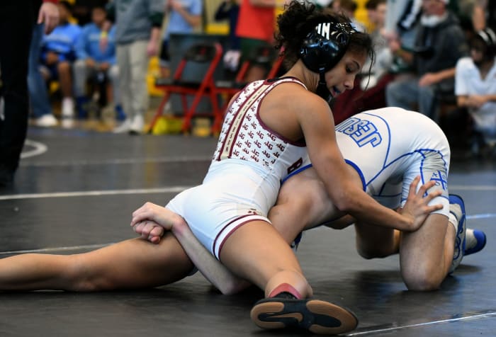 Lake Gibson’s Gabby Tedesco picks up a pivotal win in a 106-pound match against Tampa Jesuit to help deliver the Braves the FHSAA Class 2A Duals wrestling state championship on Saturday at the FHSAA Duals wrestling state championships at Osceola High School.
